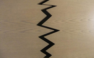 Illustration for article titled This Coffee Table Is Supposed To Break in Half